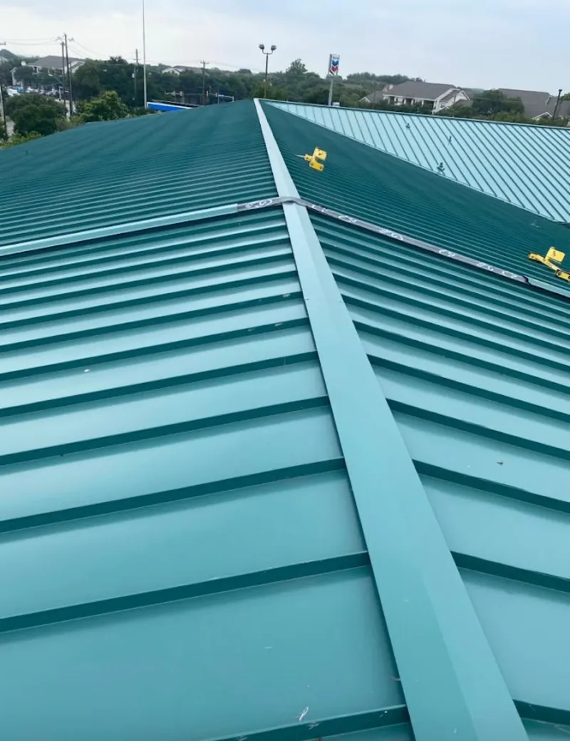 Green commercial metal roof ridge and valley for Metal Roof Repair in Bixby