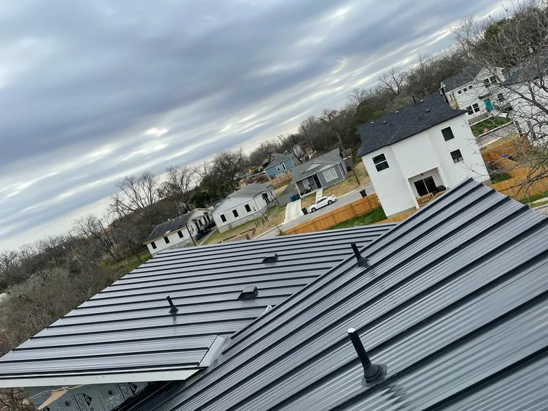 Standing seam metal roof panels with vents for Skylight Repair in Bixby